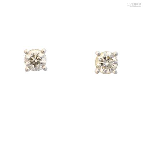 A pair of 18ct gold diamond stud earrings,