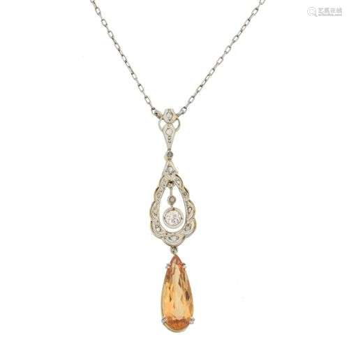 A topaz and diamond necklace,