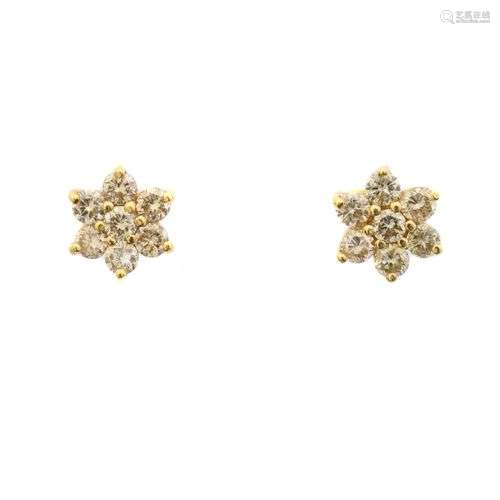 A pair of 18ct gold brilliant cut diamond floral cluster ear...