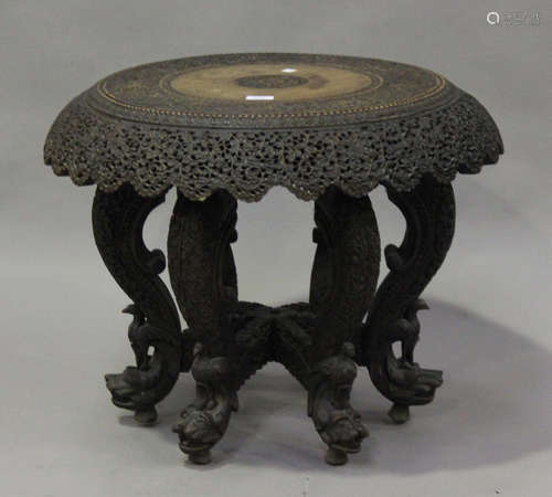 A late 19th/early 20th century Burmese hardwood revolving oc...