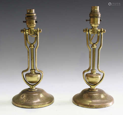 A pair of early 20th century brass Pullman carriage gimbal-m...