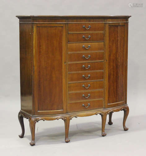 A George V mahogany bowfront side cabinet, fitted with nine ...