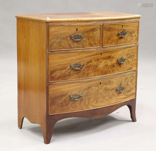 A Victorian mahogany bowfront chest of two short and two lon...