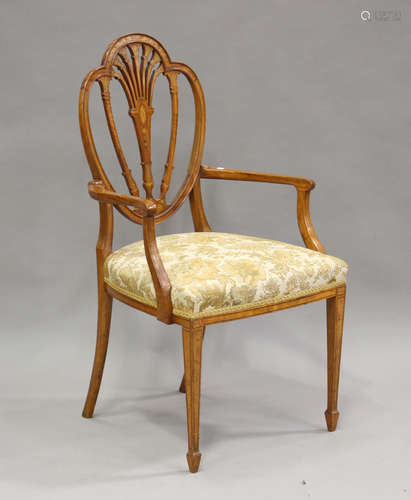 An Edwardian Irish satinwood pierced splat back elbow chair ...