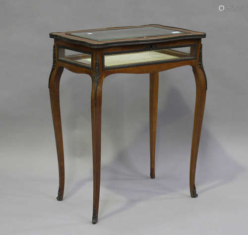 A late 19th century French rosewood bijouterie table with fo...