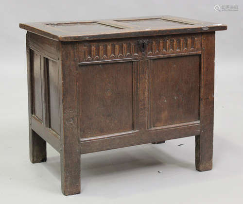 A late 17th century oak panelled coffer with stop fluted fri...