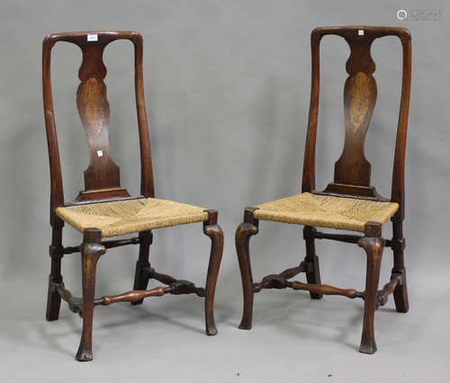 A pair of early 18th century walnut splat back side chairs, ...