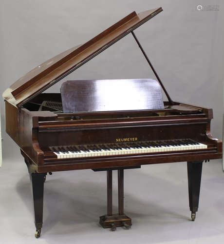 An early 20th century mahogany cased grand piano by Neumeyer...