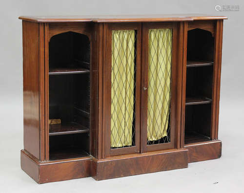 A 19th century mahogany breakfront bookcase cabinet, enclose...