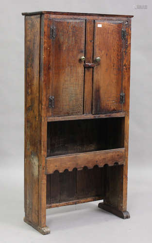 A 19th century Spanish elm side cupboard, fitted with two do...