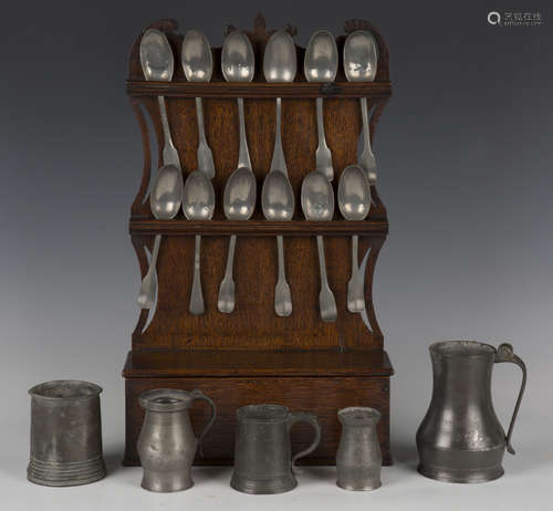 A late 19th century provincial oak wall mounted spoon rack w...