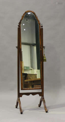 A 20th century Queen Anne style walnut framed cheval mirror,...