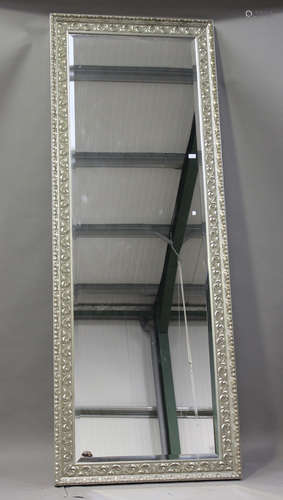 A large modern silvered rectangular wall mirror, 260cm x 95c...