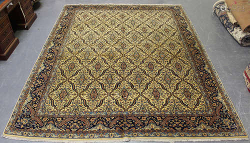 An Indian carpet, mid/late 20th century, the ivory field wit...