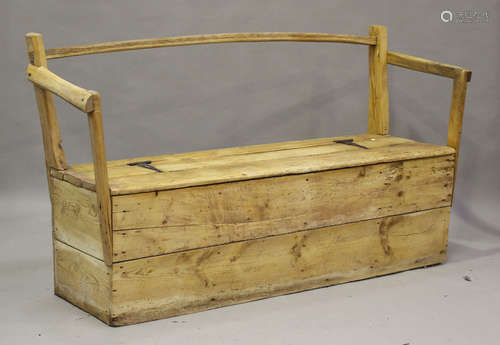 A 20th century primitive stripped pine box seat bench, heigh...