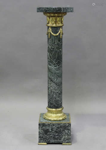 A fine 20th century green veined marble and ormolu mounted d...