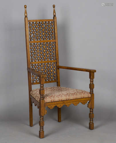 A late Victorian Anglo Moorish 'Cairene' oak framed armchair...