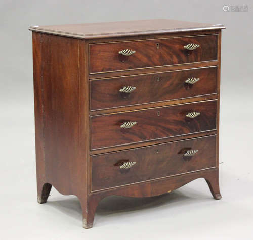 A 20th century George III style mahogany chest of four drawe...