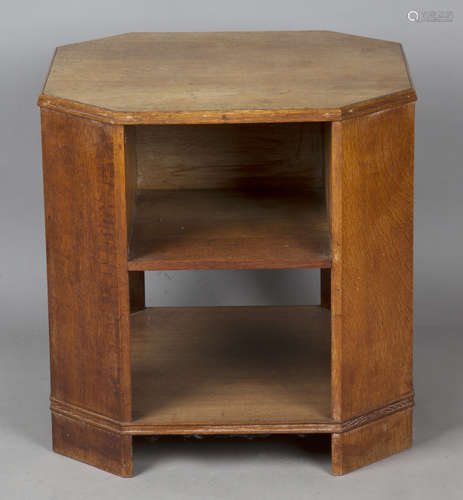 An early 20th century Heal & Son Ltd oak book table, the can...