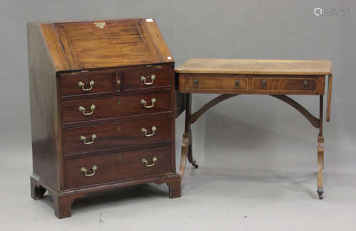 A 19th century narrow mahogany bureau, the fall front above ...