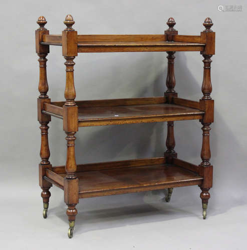 A Victorian mahogany three-tier buffet with turned supports,...