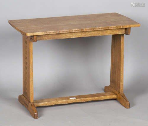 A mid-20th century Arts and Crafts style oak rectangular occ...