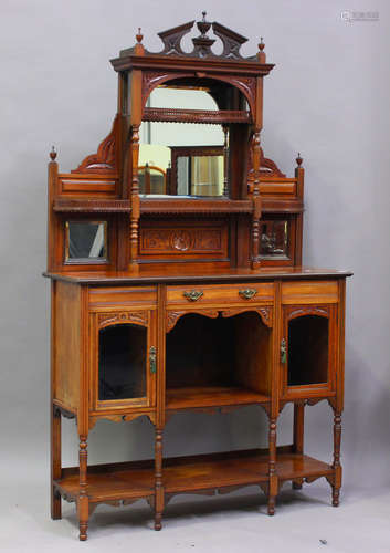 A late Victorian mahogany mirrored back side cabinet with ca...