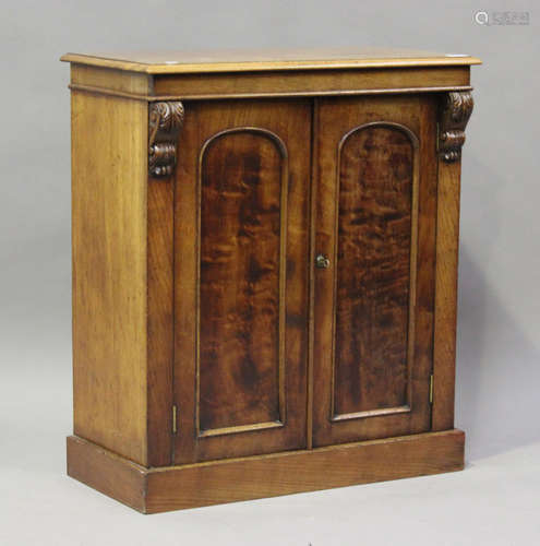 A small Victorian figured mahogany side cabinet, fitted with...