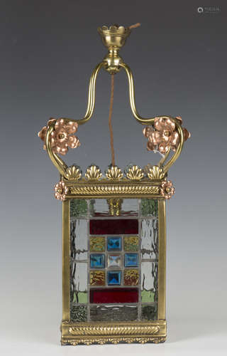 A late Victorian Aesthetic Movement brass framed and copper ...