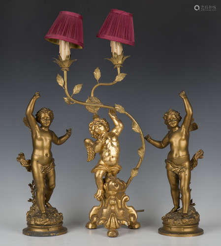 A 20th century gilt composition and wrought metal table lamp...