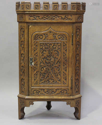 A small late Victorian Arts and Crafts Medieval Revival oak ...