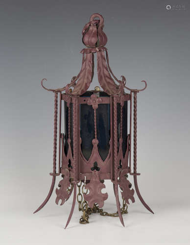 An early 20th century Gothic Revival painted wrought metal h...