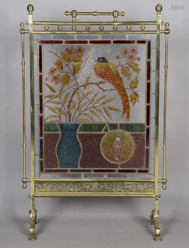 A late Victorian Aesthetic Movement brass framed and stained...