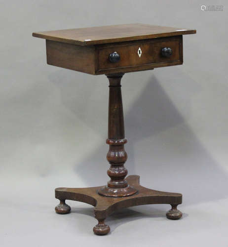 A Victorian mahogany work table, fitted with a single frieze...