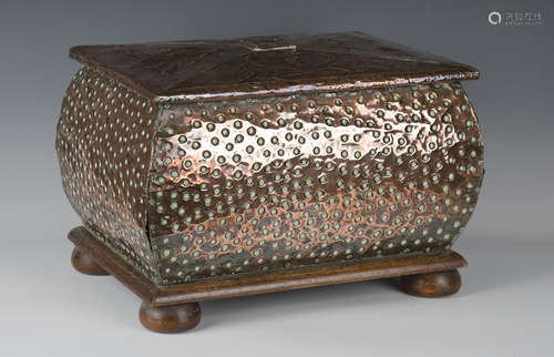 An early 20th century Arts and Crafts copper mounted coal bo...