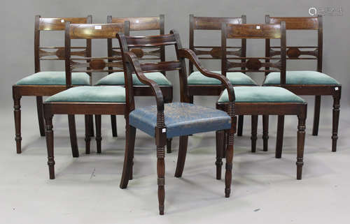 A set of six Regency mahogany bar back dining chairs with dr...