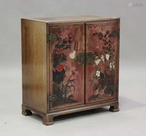 A mid/late 20th century Chinese hardwood side cabinet with r...