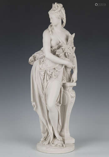 A modern reconstituted marble figure of a classical maiden b...