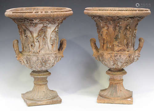 A pair of late 20th century moulded terracotta garden urns o...