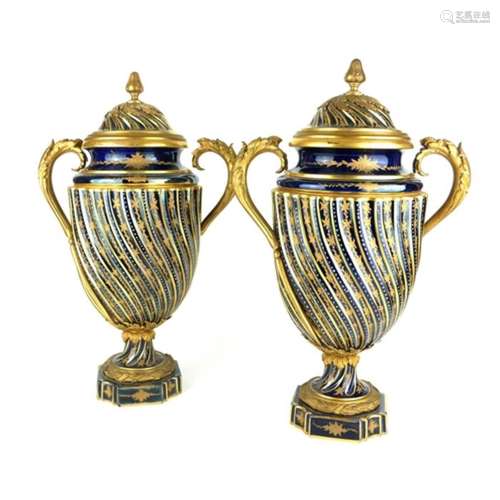 A PAIR OF 19TH CENTURY SEVRES PORCELAIN AND ORMOLU URN FORM ...