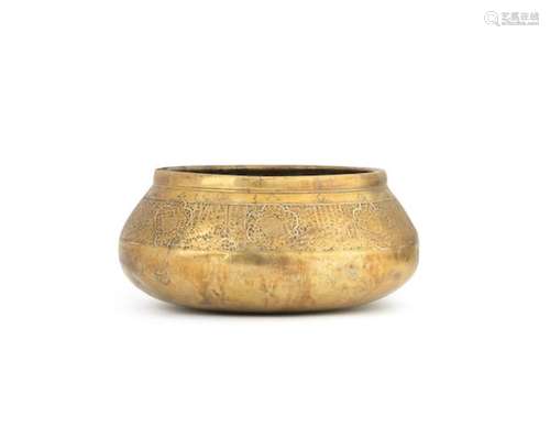 A SILVER-INLAID BRASS BOWL Persia or Mesopotamia, 14th Centu...