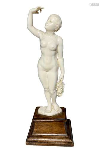 Late 19th Century Ivory Figure Of A Girl Holding Grapes