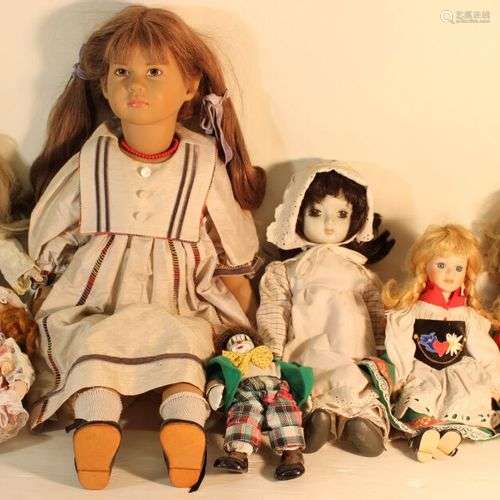Lot de 7 poupées tête porcelaine.