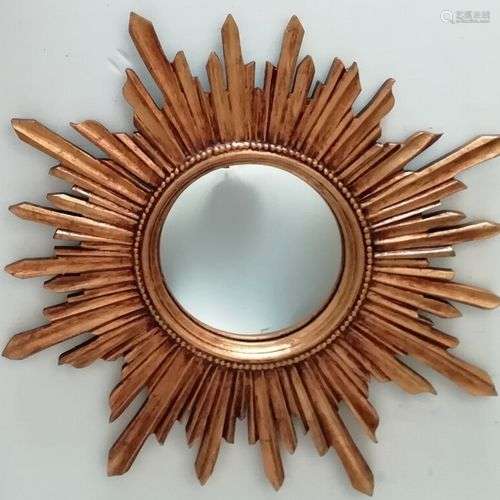 Miroir soleil vintage, avec oeil de sorcière , en bois doré....