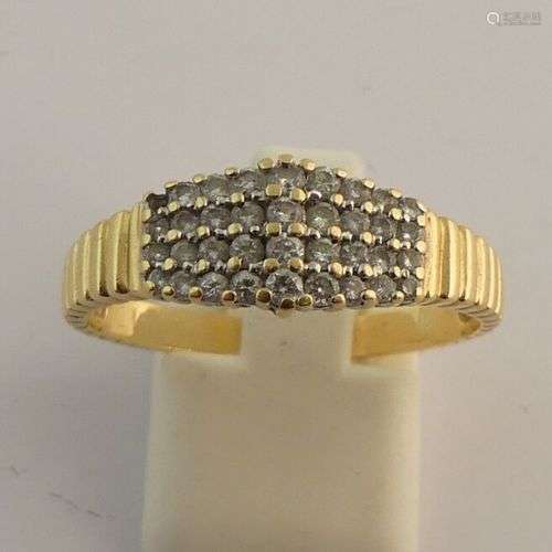 Bague en or jaune sertie de petits diamants. TDD. 62. PB. 4....