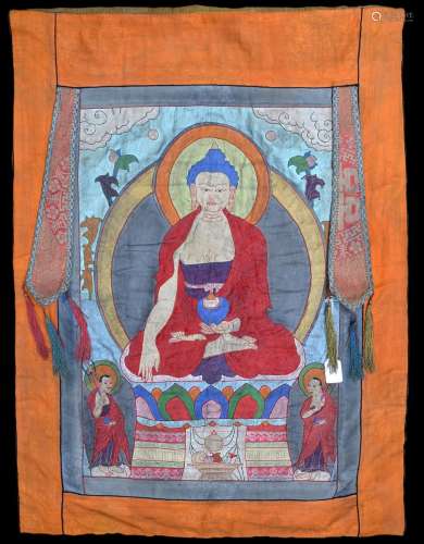 Un thangka appliqué en soie 'Buddha Medecin' (h61x43cm)