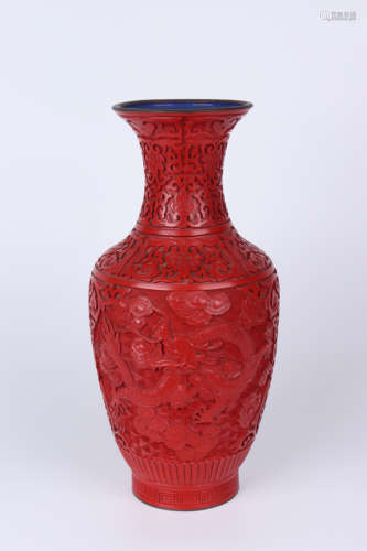 A carved lacquer dragon vase