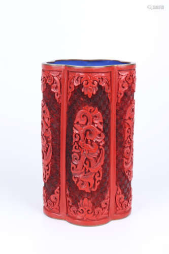 A carved lacquer brush holder