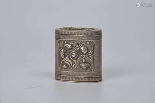 A silver tobacco paste box