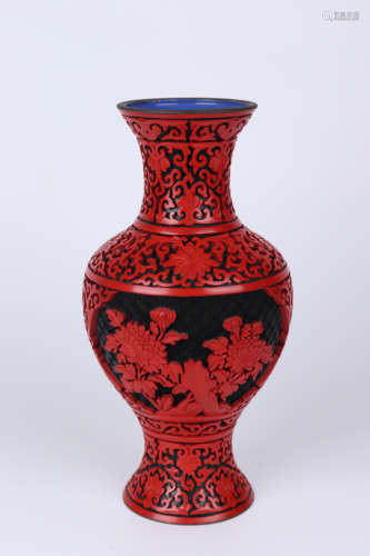 A carved lacquer vase